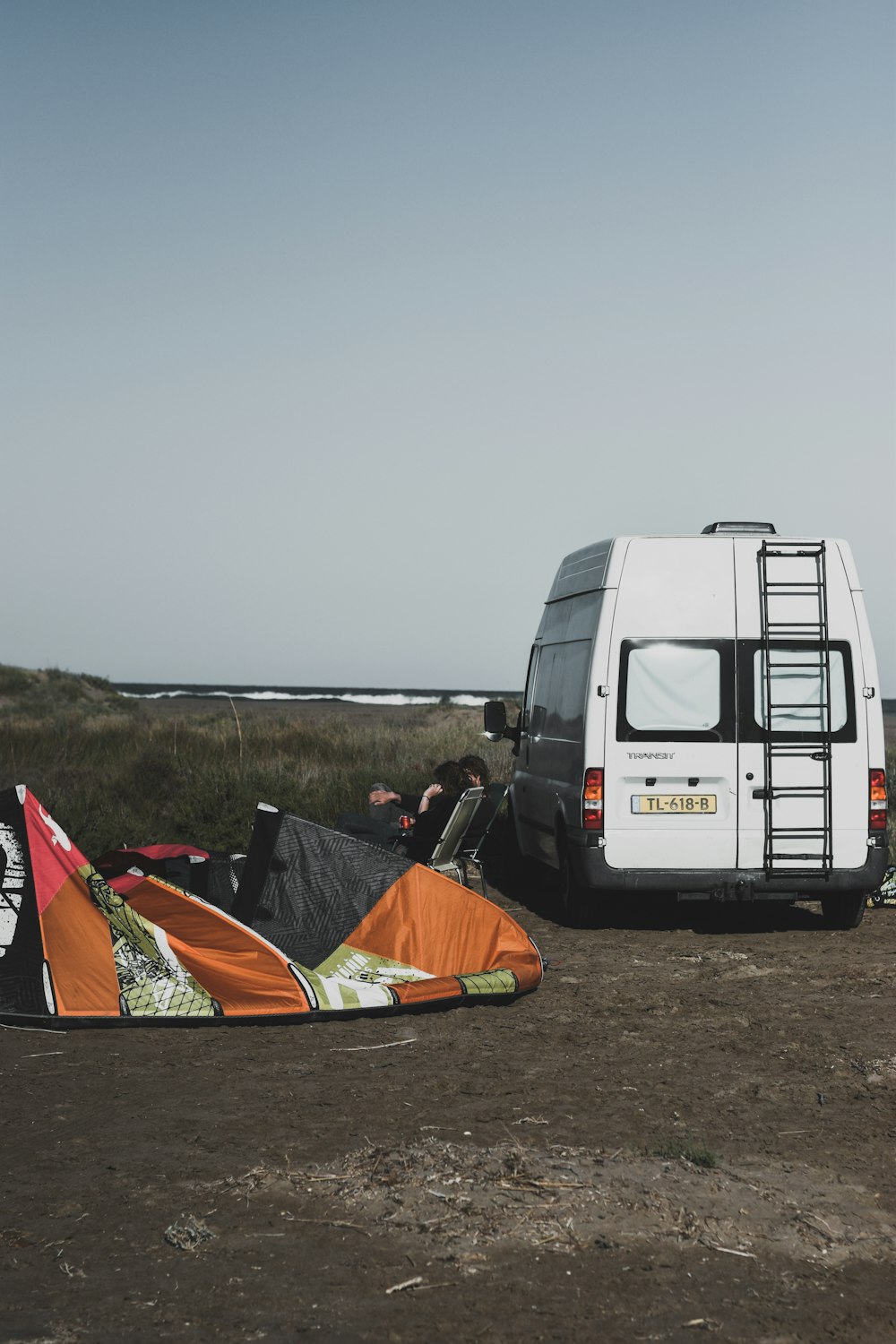 vehicle next to tent