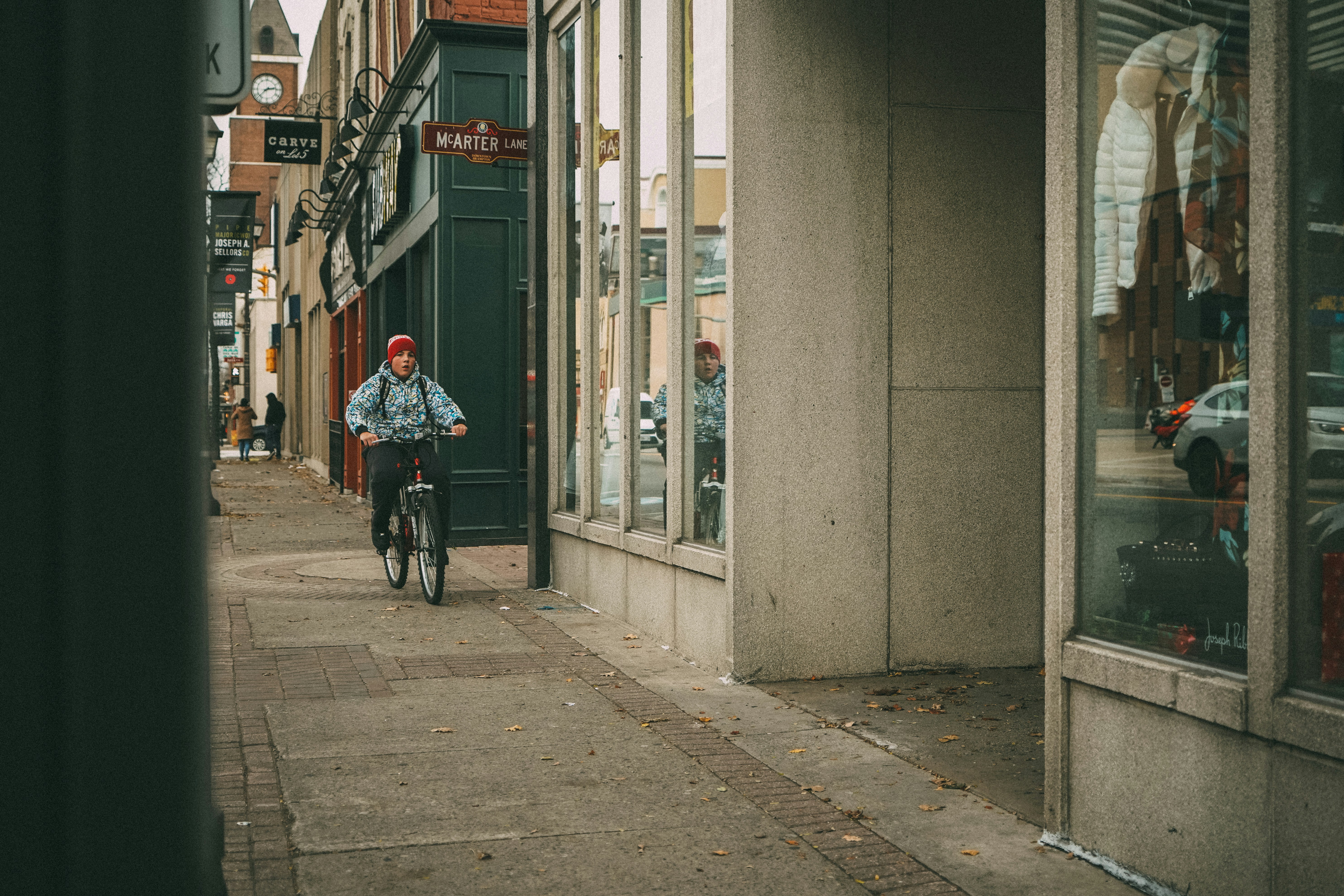 riding bike on sidewalk