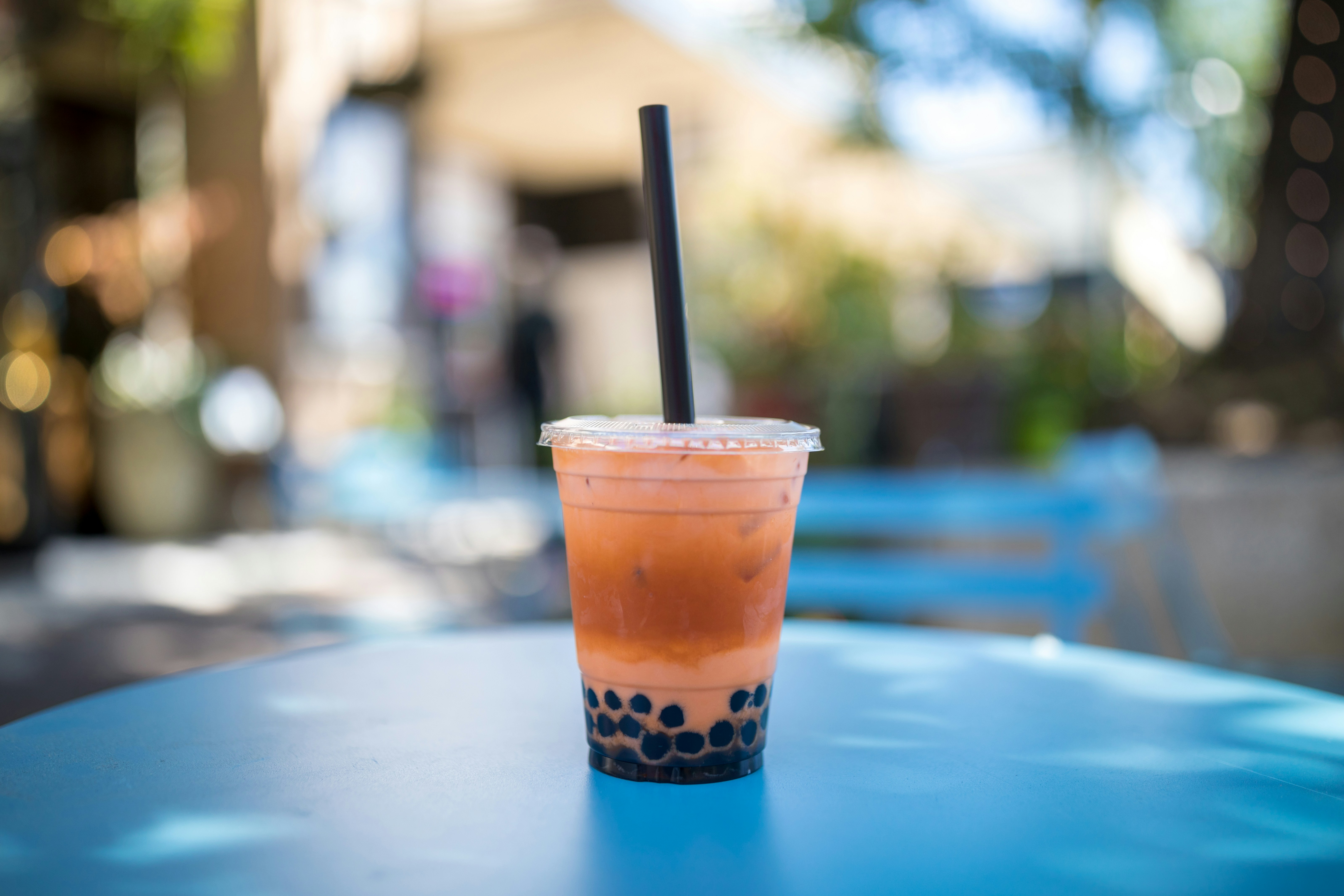 clear plastic cup with straw