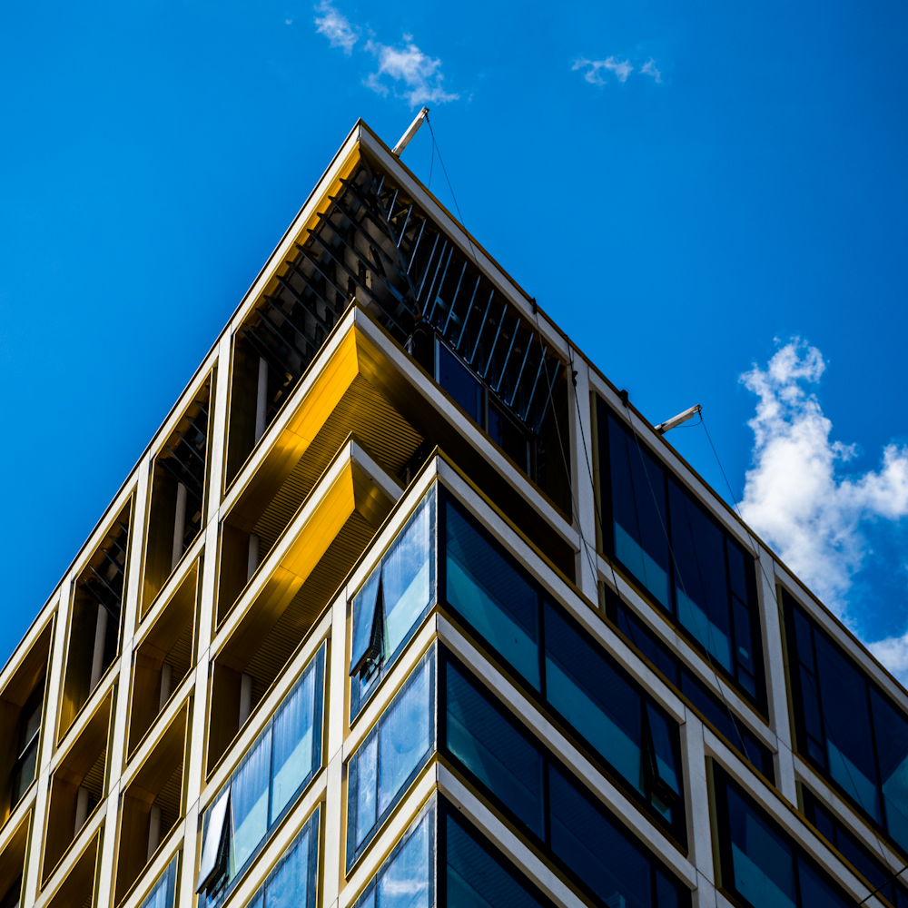 worm view photo of brown concrete building