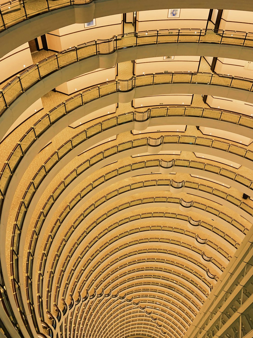 a very long tunnel with a clock on the side of it