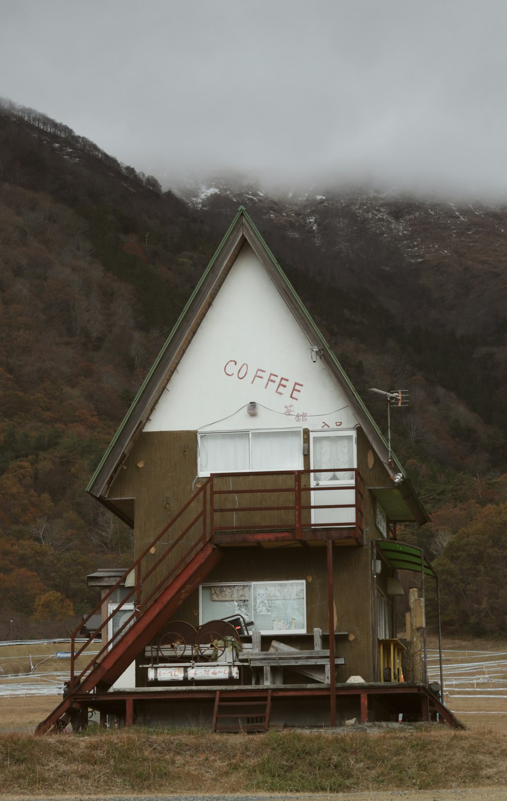 brown house near mountain