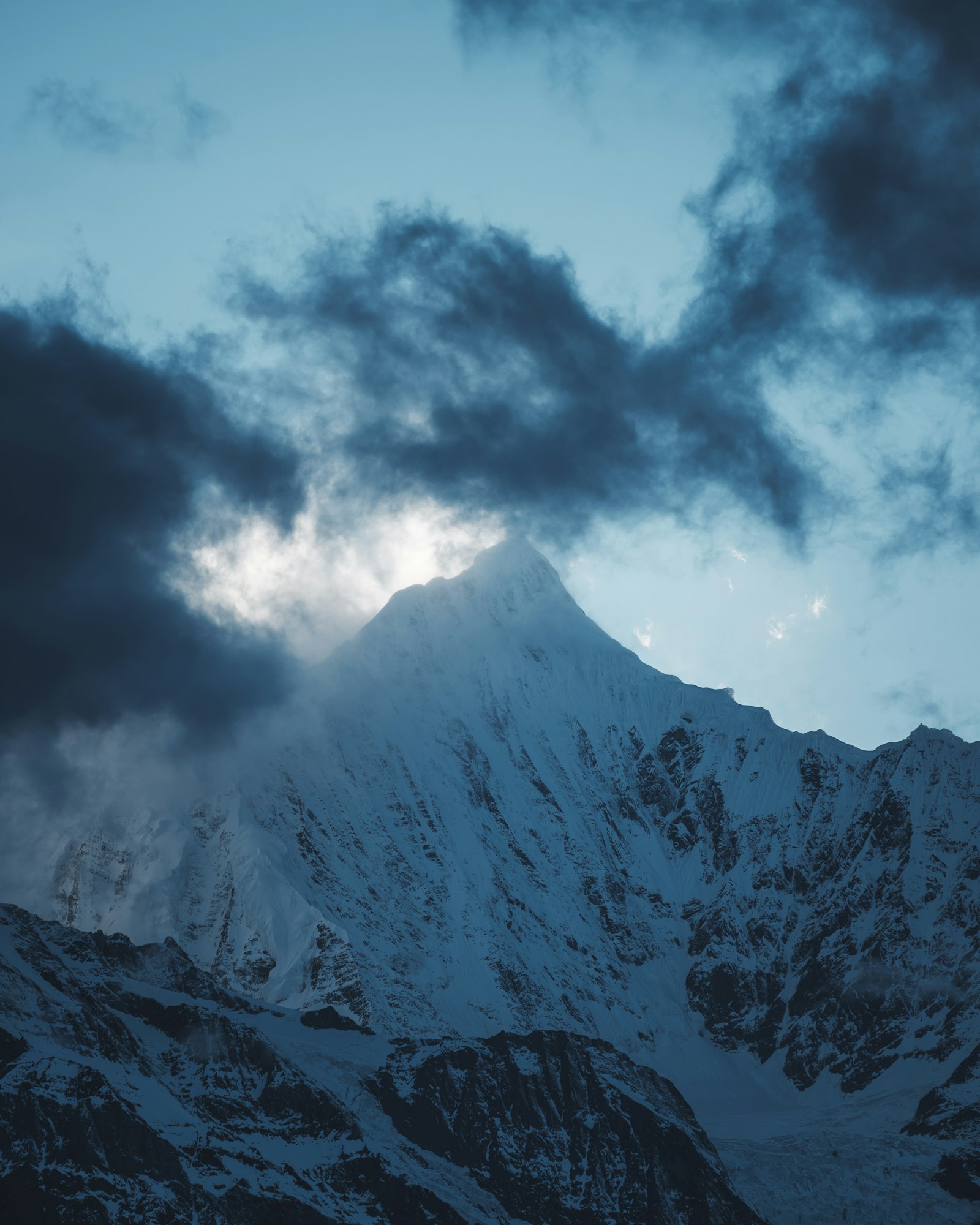 Sony a7S II sample photo. Snow-covered mountain under gray photography