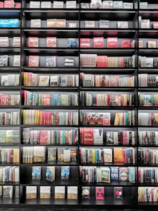 A cozy bookstore shelf filled with a variety of colorful books.
