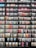 A vibrant bookshelf filled with various genres of books, showcasing a love for reading.