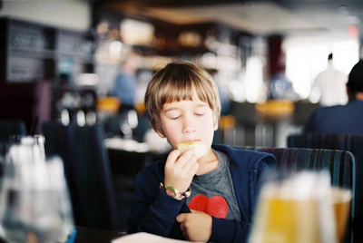 boy wearing blue jacket