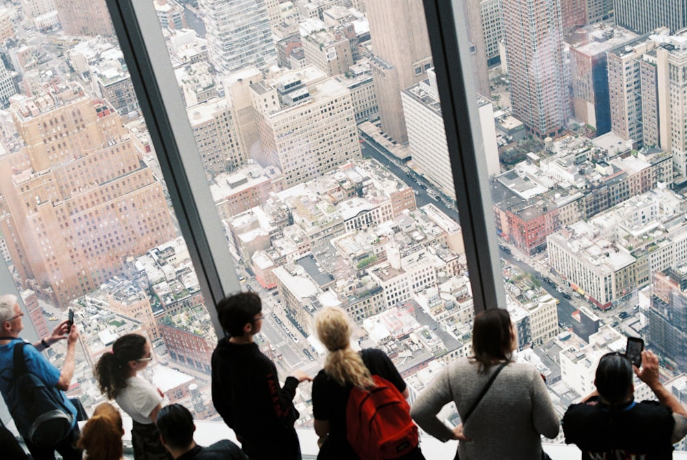 people over looking at building