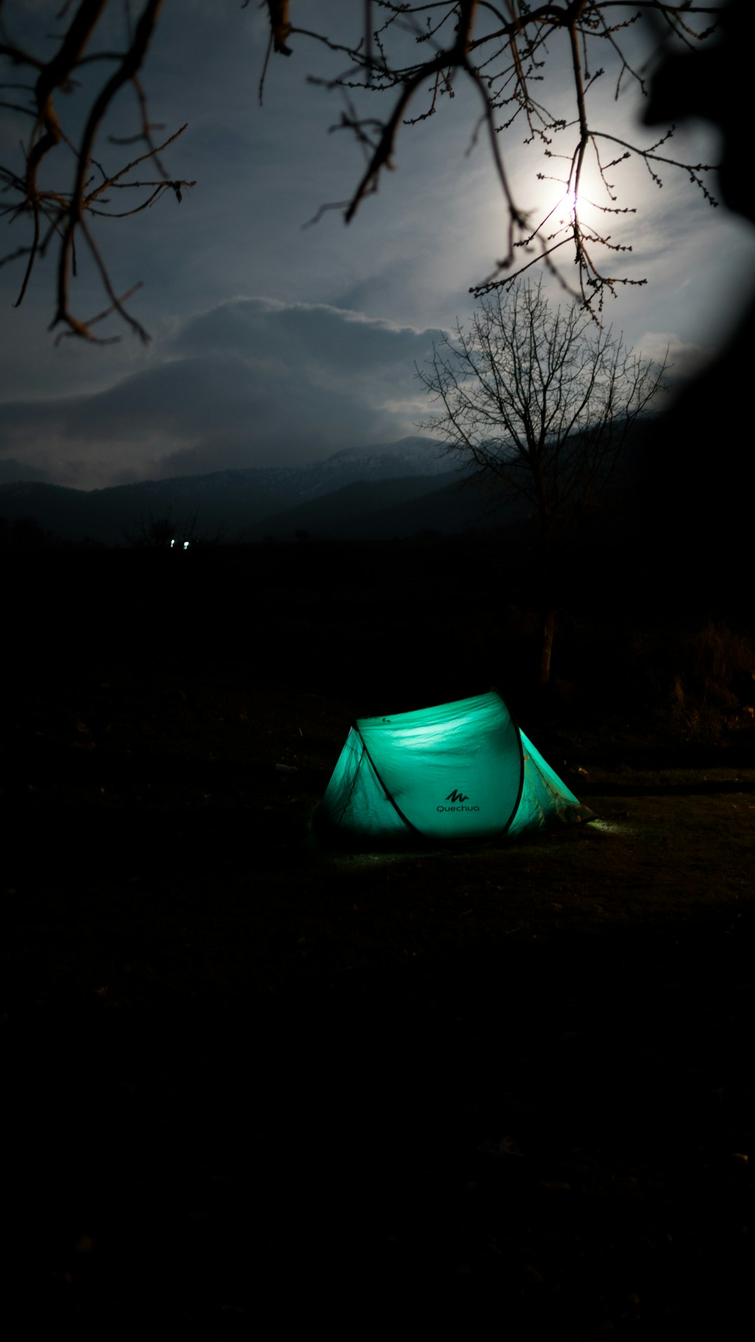 green dome tent with light inside