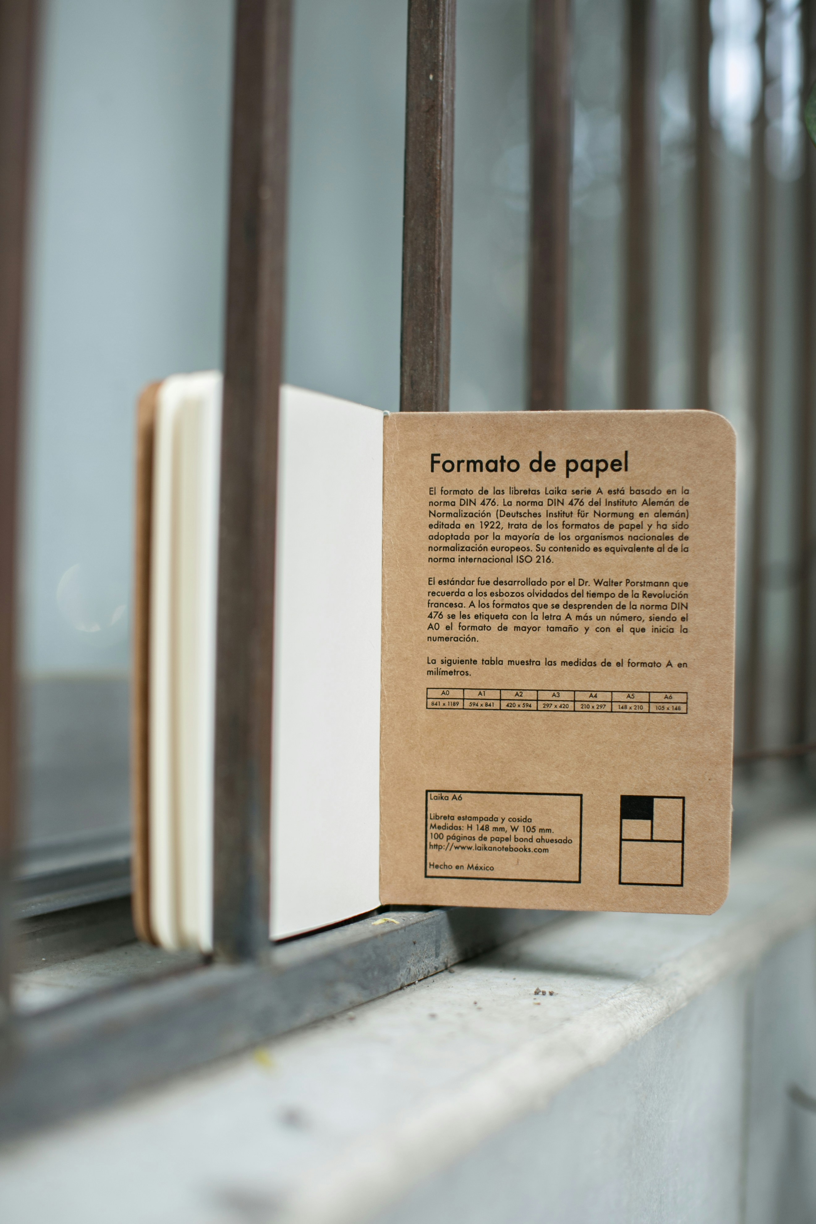 a book sitting on top of a window sill