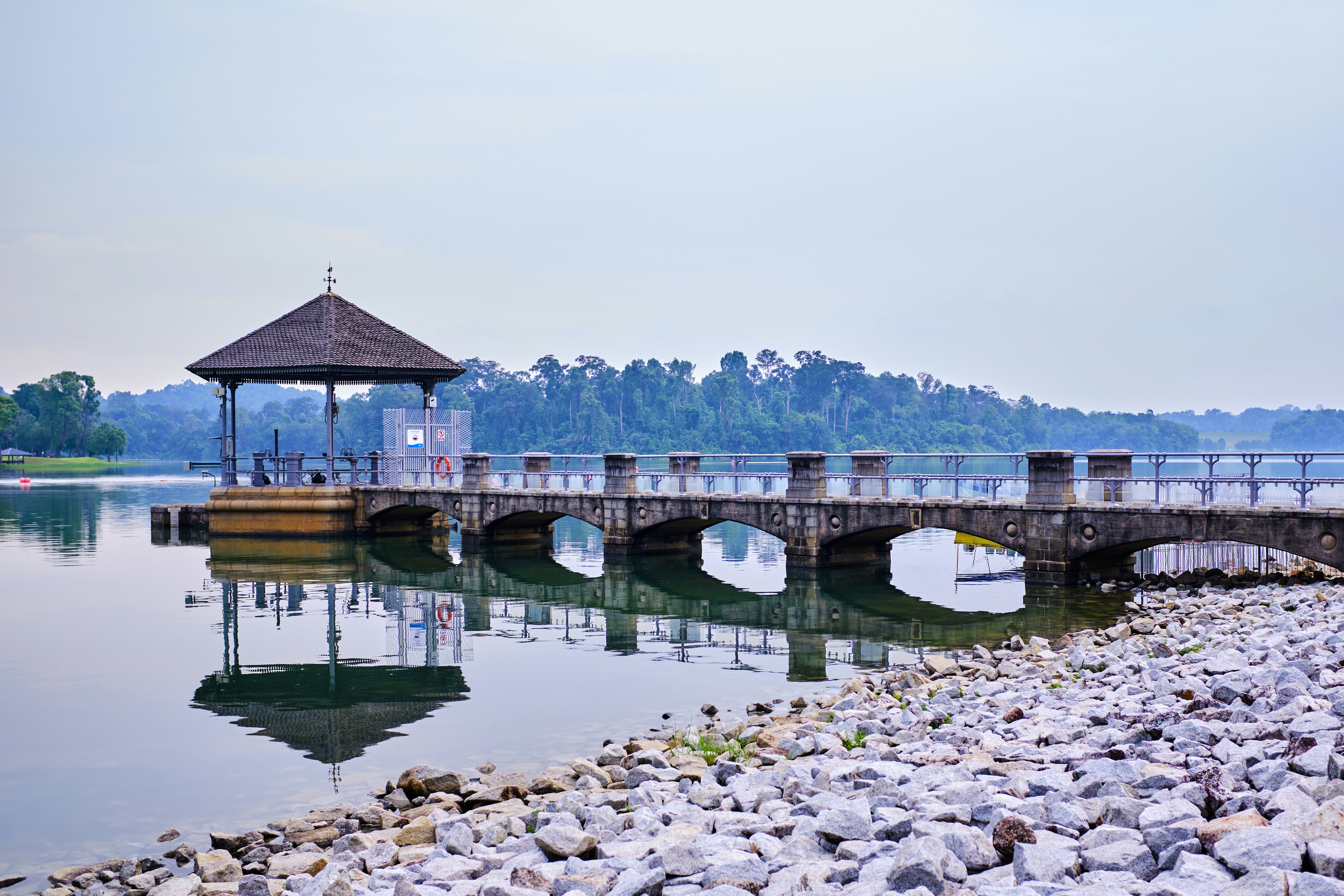 brick dock with gazebo during day