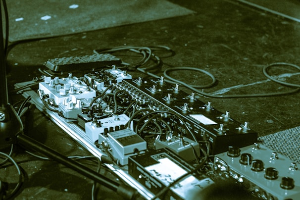 Retro-style pedalboard with colorful distortion and delay pedals arranged neatly