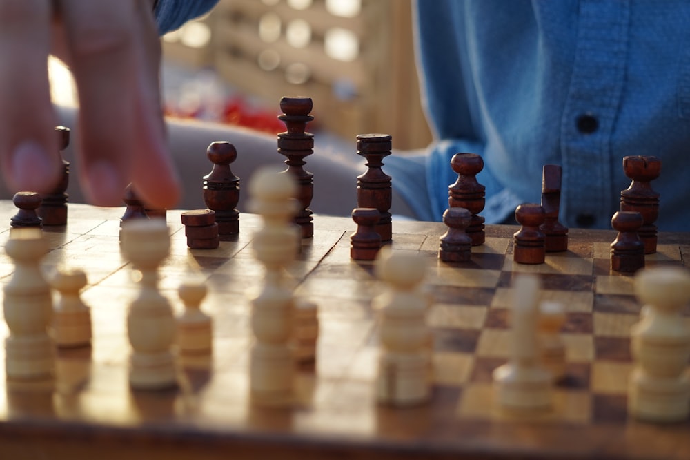 beige and brown chess board game set