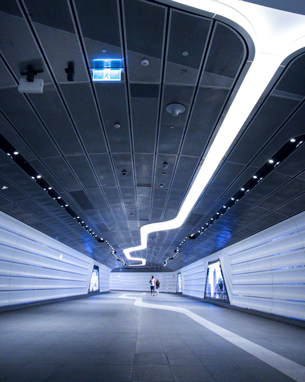 person standing inside corridor