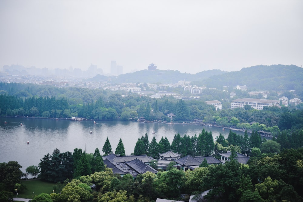 body of water near a house during daytime