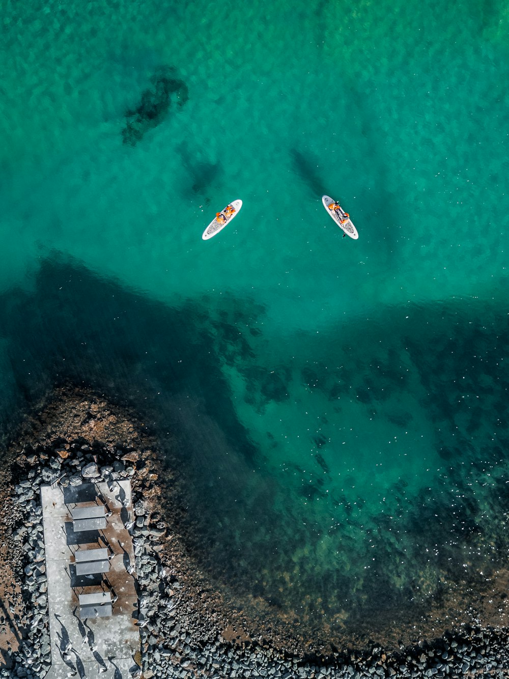 two white boats on ocan