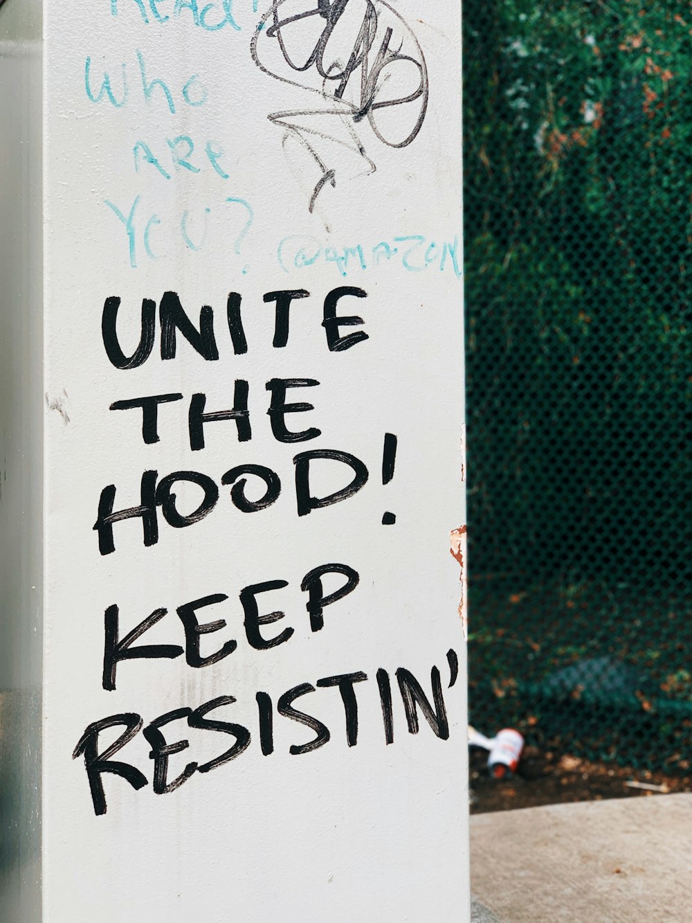 unite the hood sign