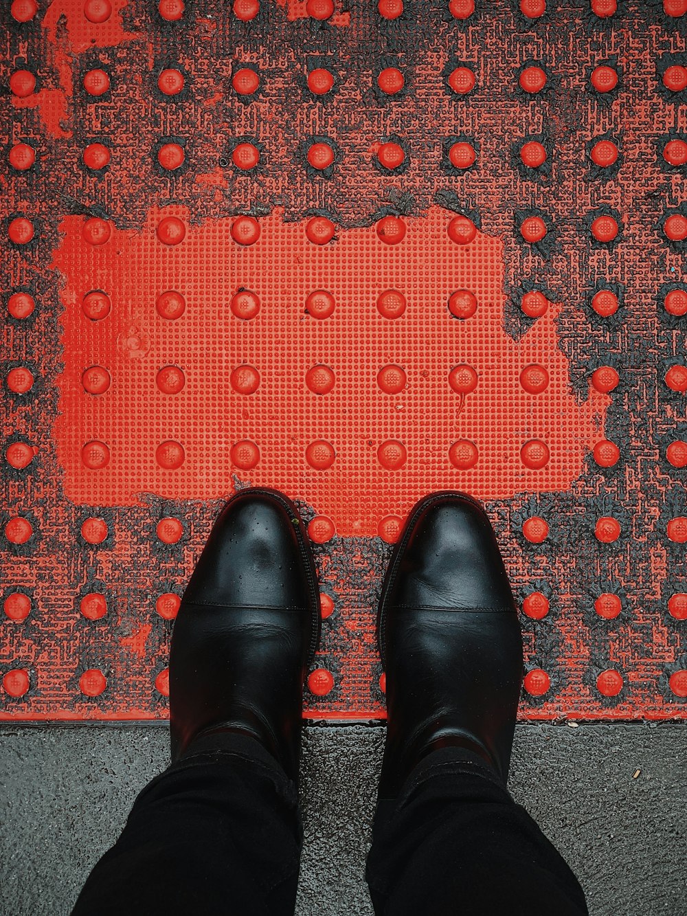 pair of black leather shoes