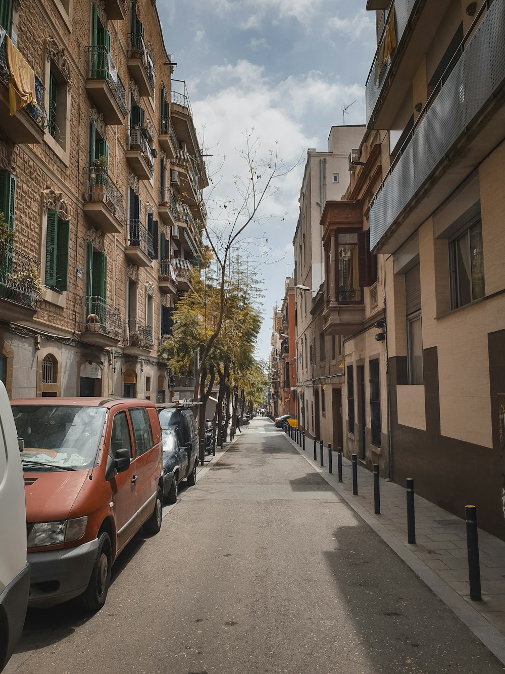 vehicles parked in between buildings