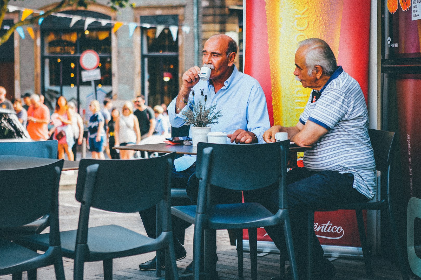 Diverse group of people in a meeting discussing and communicating