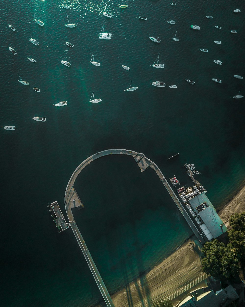 aerial photo of boat on calm water