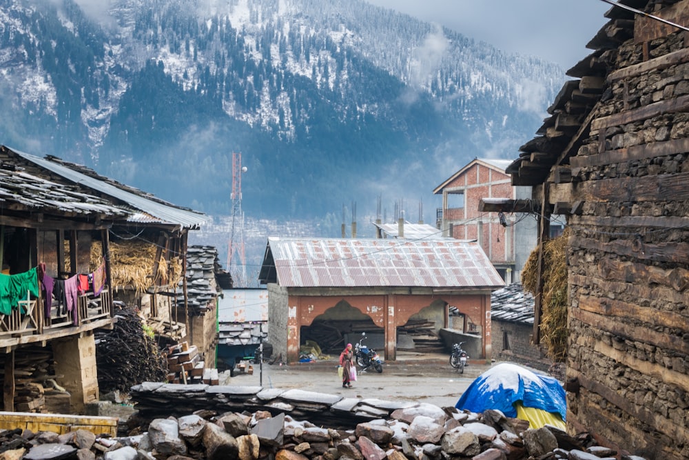 people near houses