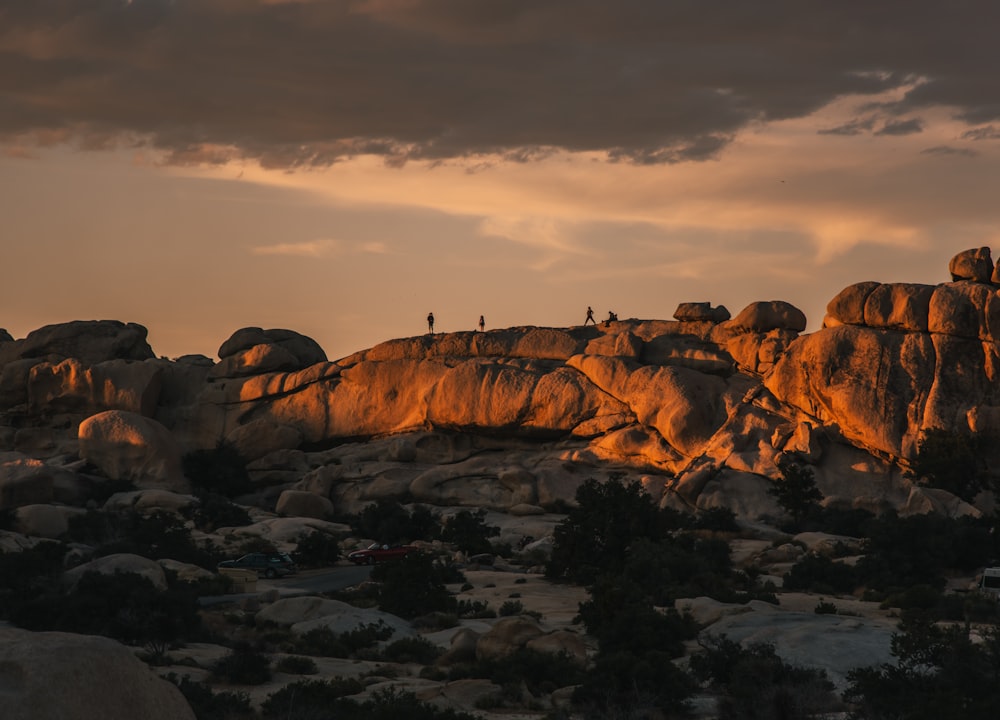 people on rocks