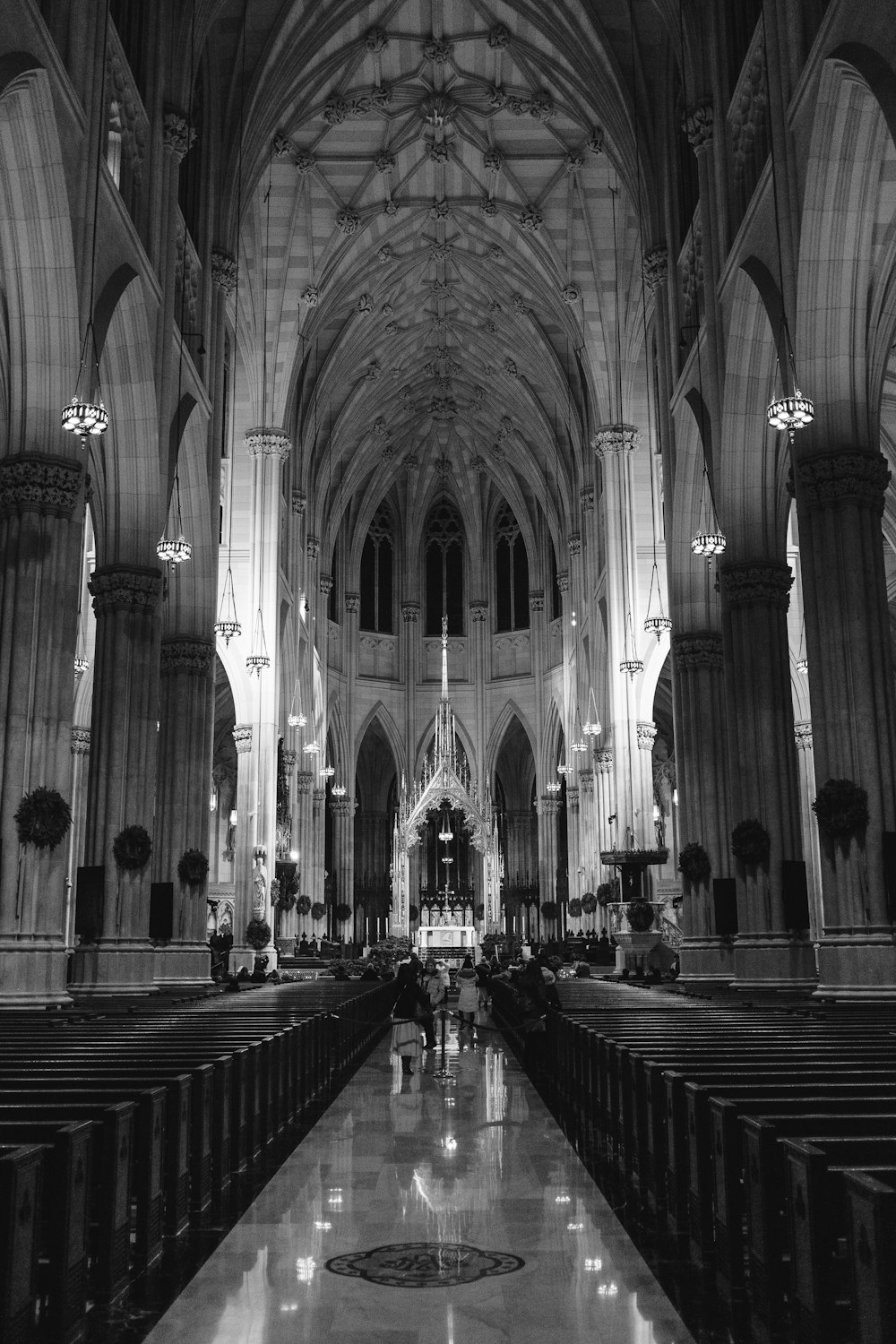 grayscale photo of cathedral interior