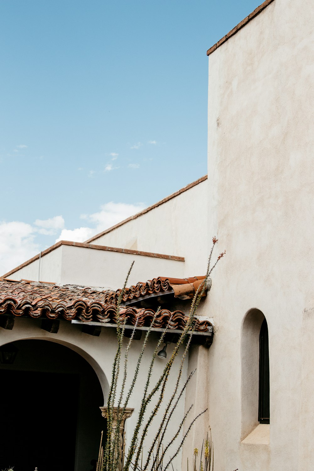 brown roof and beige concrete wall