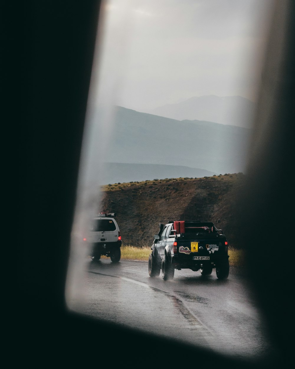 black pickup truck on road during daytime