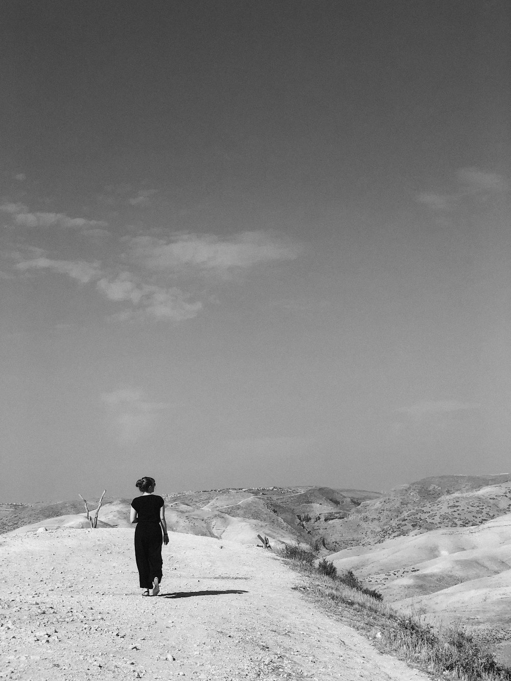 woman walking on road