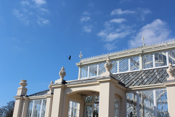 A cozy conservatory transformed with a traditional-style plastic roof blending seamlessly with the home's brickwork.