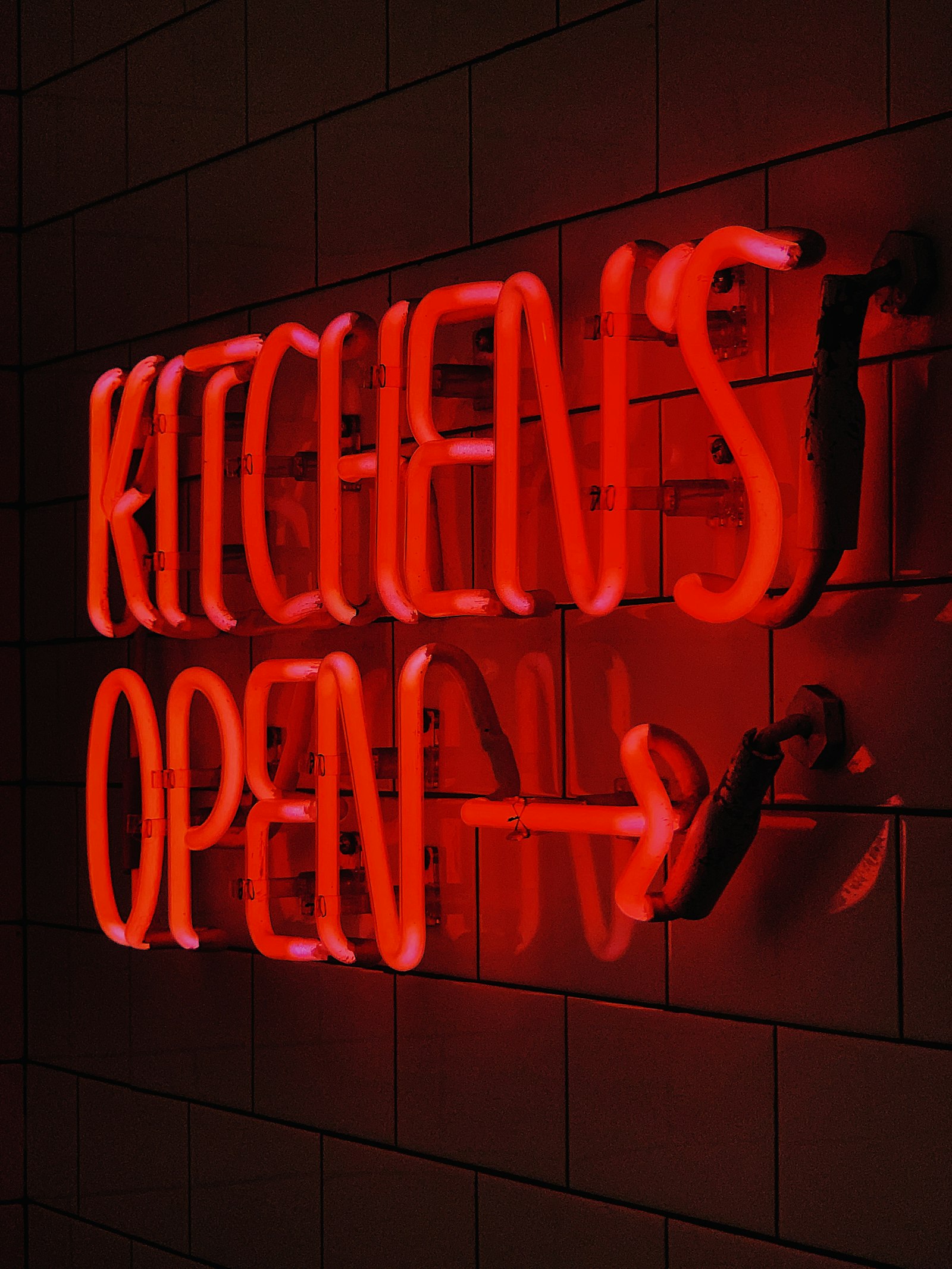 Apple iPhone XS Max + Moment Tele 58-60mm sample photo. Kitchen's open neon sign photography