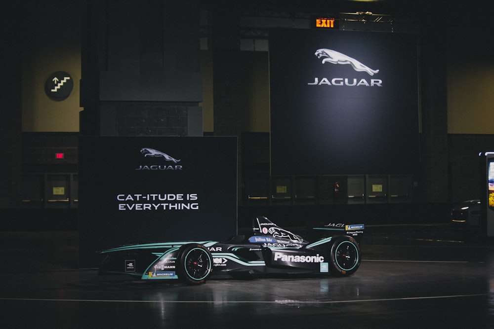 displayed black Jaguar racing car