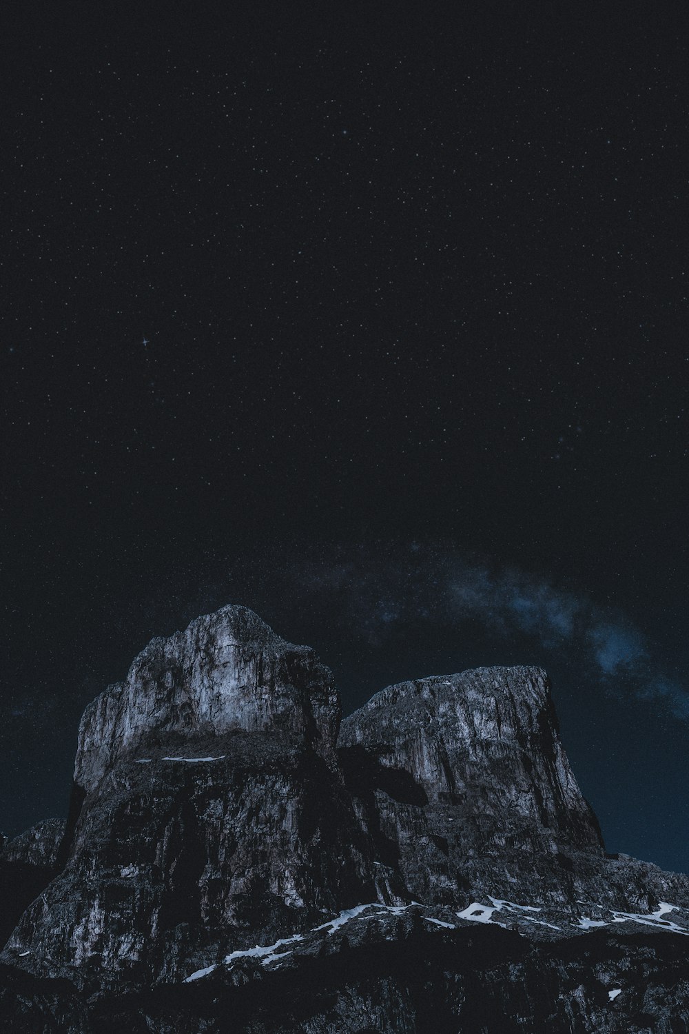 gray rock formation at night