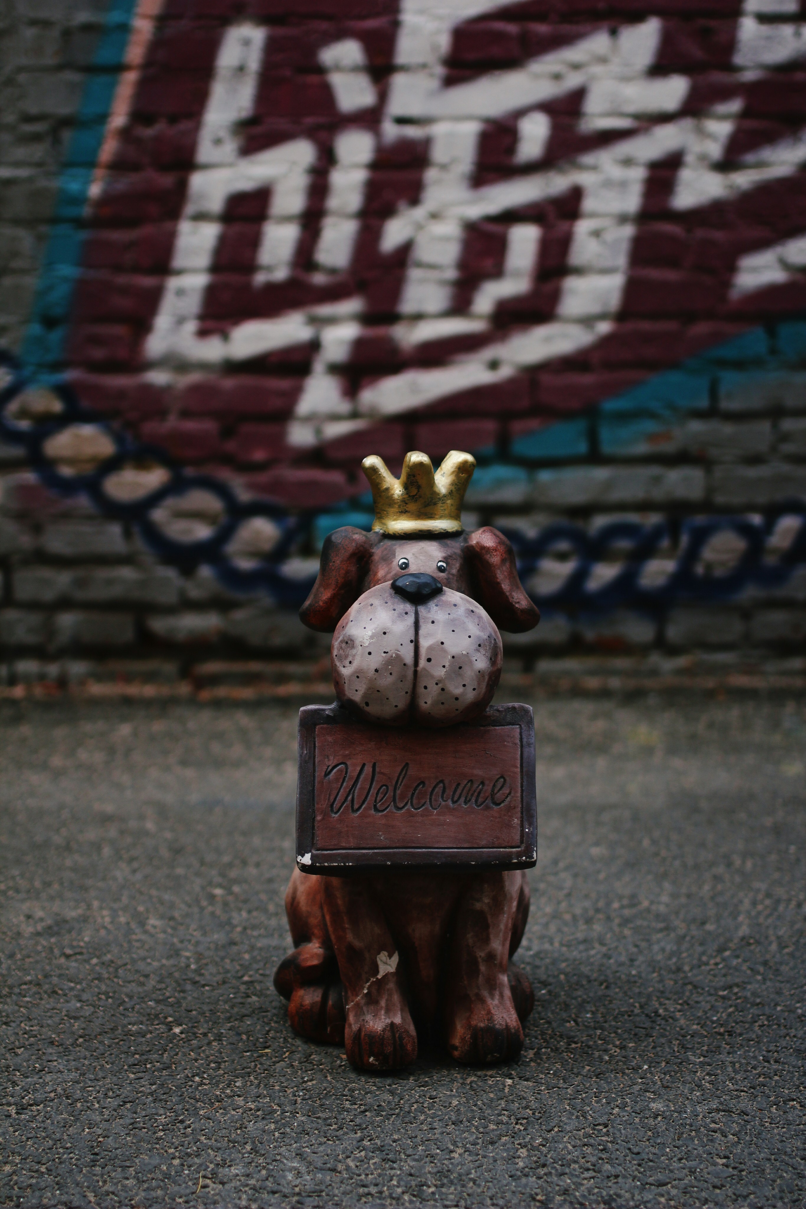 brown wooden dog statue