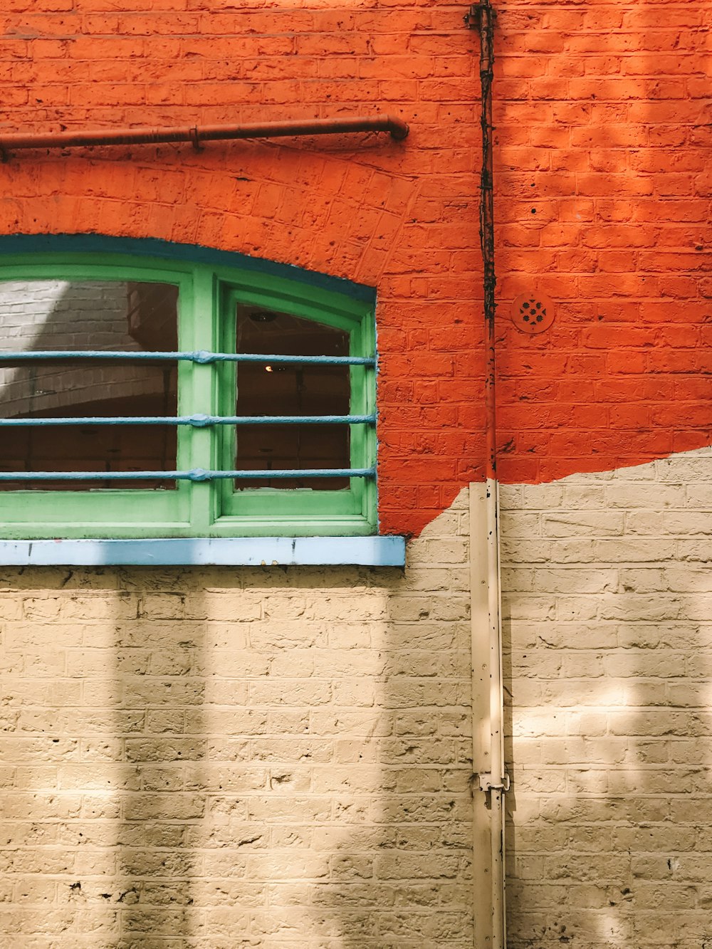 orange and white concrete wall