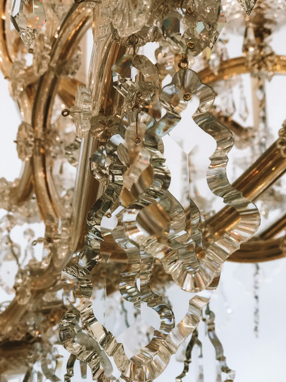 a chandelier hanging from a ceiling in a room