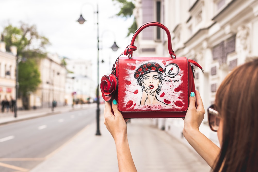 red and pink leather crossbody bag