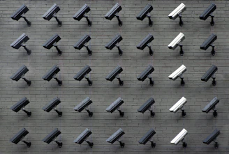 assorted-color security cameras