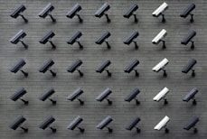 assorted-color security cameras