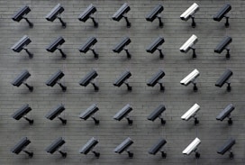 assorted-color security cameras