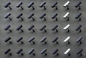 assorted-color security cameras