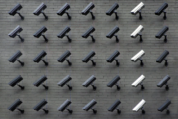assorted-color security cameras