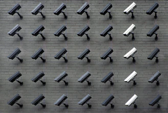 assorted-color security cameras
