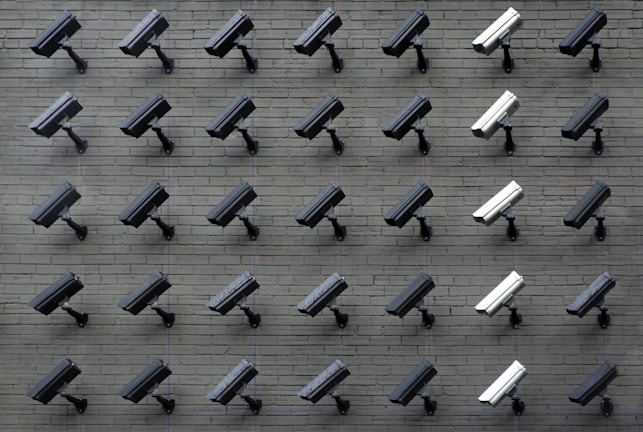 assorted-color security cameras