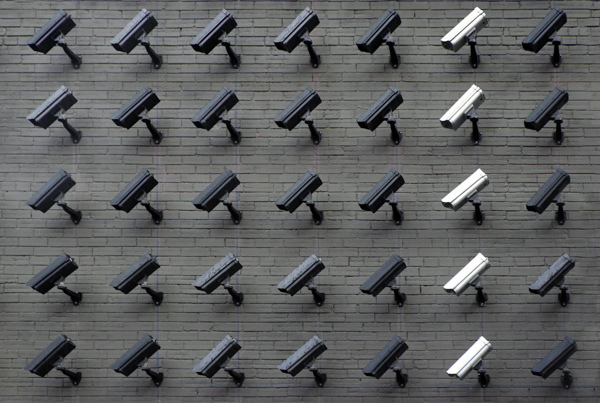 photo-1557597774-9d273605dfa9?auto=format&amp;fit=crop&amp;w=1200&amp;q=60 SIRA CCTV Requirements for Dubai Businesses | Rounak Computers LLC
