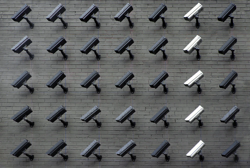 Security cameras mounted on a wall