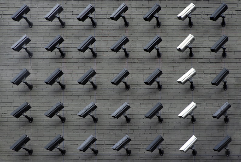 Security camera in dark tones with an accent