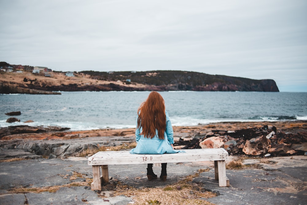 woman sitting on bench