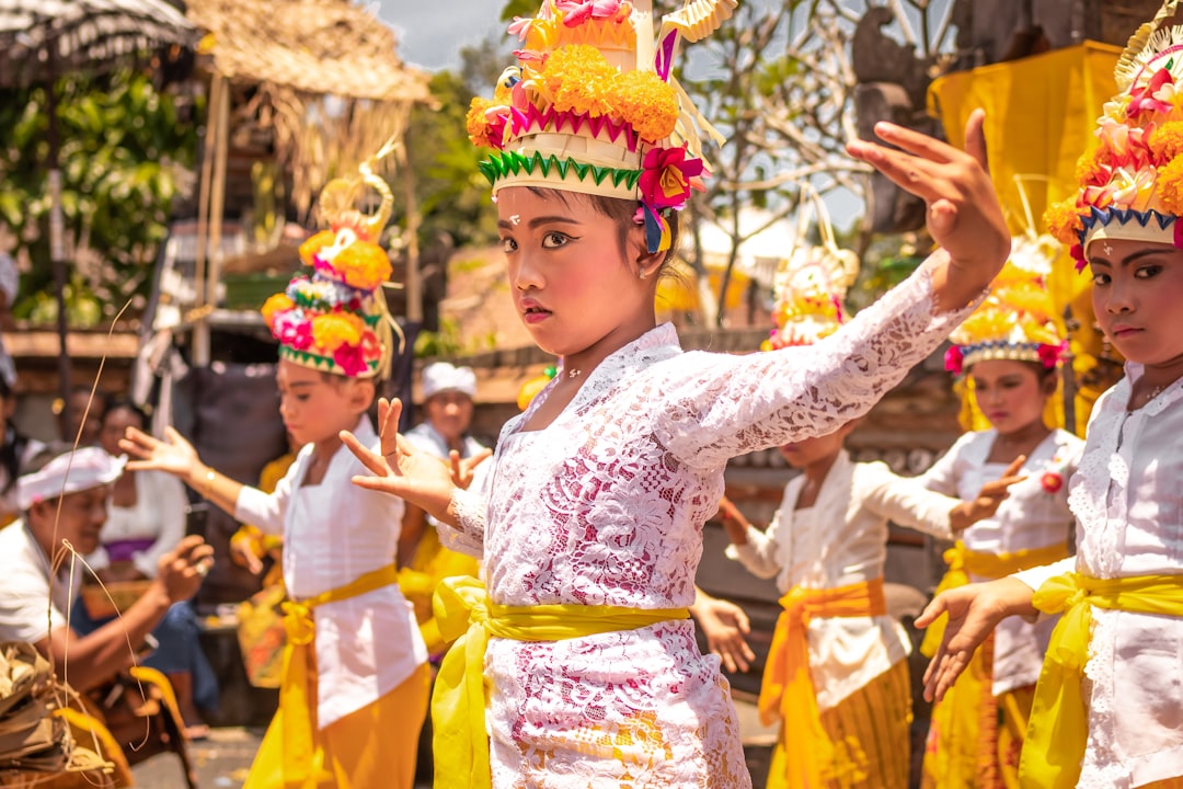 girl wearing yellow and white floral dress